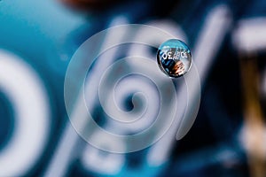 Macro shot of water drop reflection