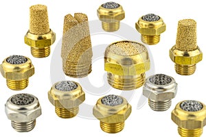 Macro shots of several randomly arranged air silencers covered with brass balls and a metal mesh, isolated on a white background.