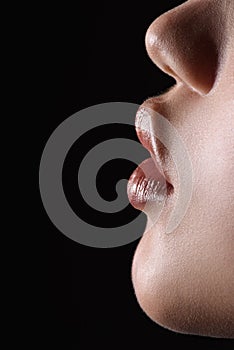 Macro side view of sensual lips and chin