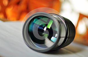 Macro of a slr camera zoom lens reflecting window