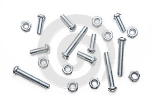 Macro Of A Small Collection Of Iron Screws And Bolts In A Whitebox