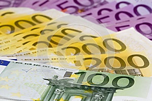 Macro stack of money with 100 200 and 500 euro banknotes