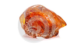 Macro stone amber mineral on white background