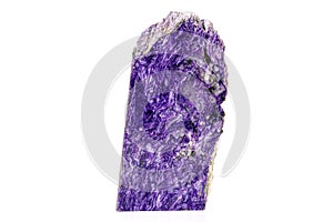 Macro stone Charoite mineral on white background