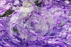 Macro stone Charoite mineral on white background