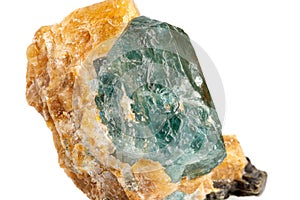 Macro stone mineral apatite in calcite on a white background