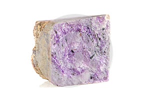 Macro stone mineral charoite on a white background