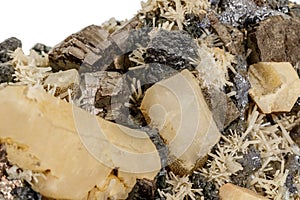 Macro stone mineral Pyrrhotite, quartz, Sphalerite, calcite, Galena on white background photo