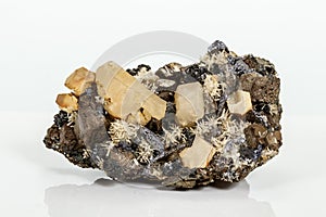 Macro stone mineral Pyrrhotite, quartz, Sphalerite, calcite, Galena on white background photo
