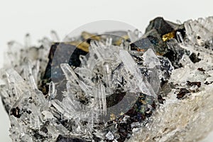 Macro stone mineral Pyrrhotite, quartz, Sphalerite, calcite, Galena on white background photo