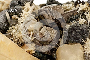 Macro stone mineral Pyrrhotite, quartz, Sphalerite, calcite, Galena on white background photo