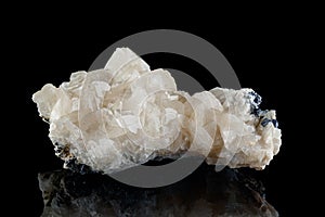 Macro stone mineral Quartz on Galena on a black background