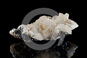 Macro stone mineral Quartz on Galena on a black background