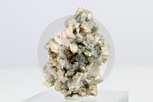 Macro stone mineral stilbite on Apophyllite on a white background