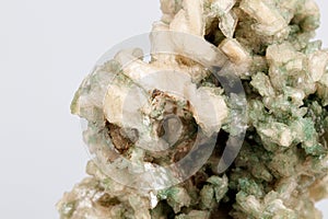 Macro stone mineral stilbite on Apophyllite on a white background