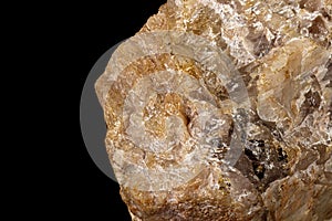 Macro of a stone Moonstone mineral on a black background