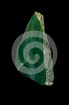 Macro stone Nephrite mineral on black background