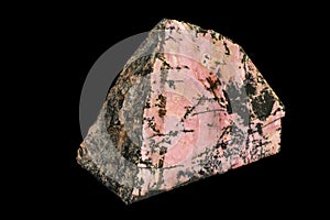 Macro stone Rhodonite mineral on a black background