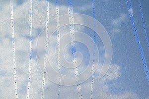 Macro texture of water droplets on window surface