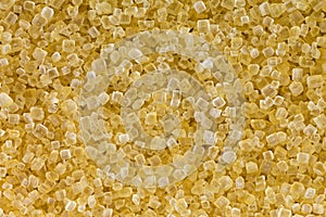 Macro of unrefined unbleached Crystalline sugar in crystal brown