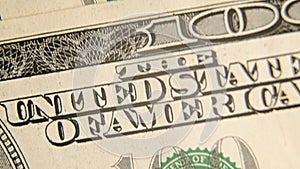 Macro video, Close-up of isolated dollar bills being laid on the table, Portraits of George Washington and Benjamin