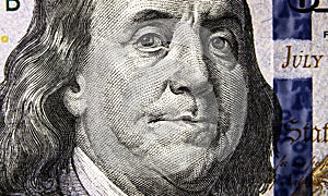 Macro view of 100 US dollar bill, Benjamin Franklin portrait