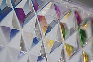 Macro view of beautiful lead crystal glass with diamond cut facets