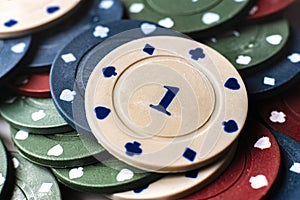 a macro view of different color poker playing chip