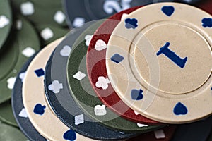 a macro view of different color poker playing chip