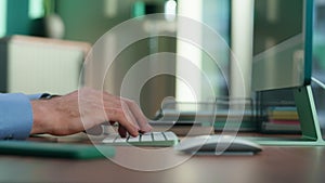 Macro view director hands typing keyboard. Closeup man fingers working computer