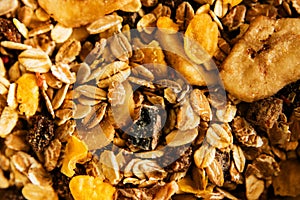 Macro view of muesli with dried banana and raisin