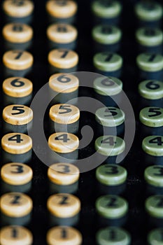 Macro View of Numbered Buttons on Antique Adding Machine