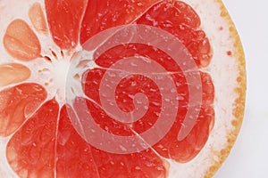 Macro view of ruby red grapefruit slice