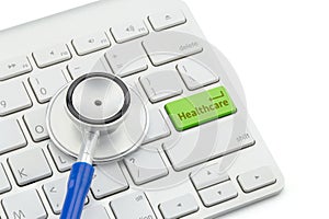 Macro view of a stethoscope on computer keyboard and key botton
