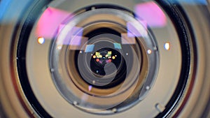 A macro view on a working video camera lens.