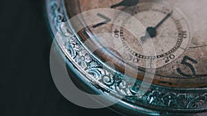 Macro vintage pocket watch time going fast