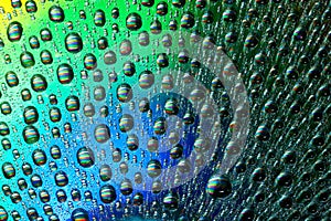 Macro of water drops on multicolor background