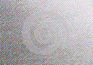 Bright CMYK Halftone Dots on White Textured Paper