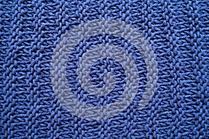 Macro of a woolen blue sweater. Knitting Pattern