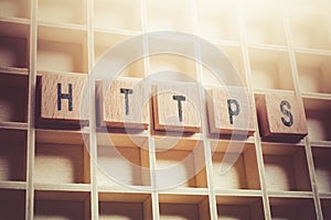 Macro Of The Word HTTPS Formed By Wooden Blocks In A Typecase