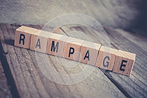 Macro Of The Word Rampage Formed By Wooden Blocks On A Wooden Floor