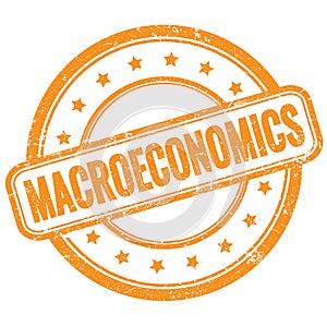 MACROECONOMICS text on orange grungy round rubber stamp