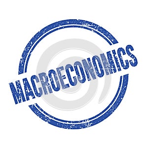 MACROECONOMICS text written on blue grungy round stamp