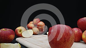 Macrography of apple display in various forms with black background. Comestible.