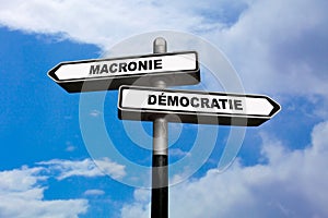 Macrony or Democracy direction signs