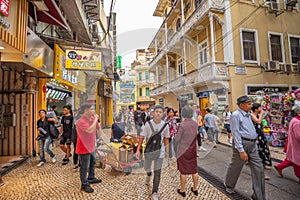 Macua street with many shops and restaurants