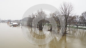 Macvanska Mitrovica, Serbia, 01/27/2023 The bridge over the Sava River. Flooding after heavy rains and snowmelt. A swift