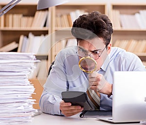 Mad auditor looking for errors in the report