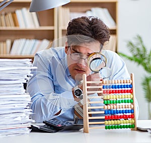 The mad auditor looking for errors in the report