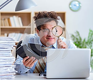 Mad auditor looking for errors in the report